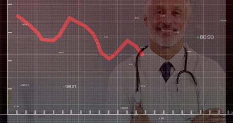 Animation of financial data over happy senior caucasian male doctor - Powered by Adobe