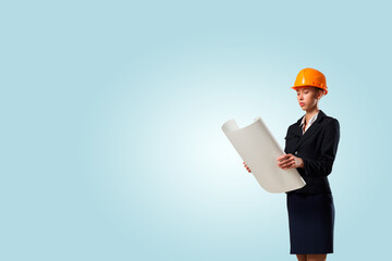 Female builder in the helmet