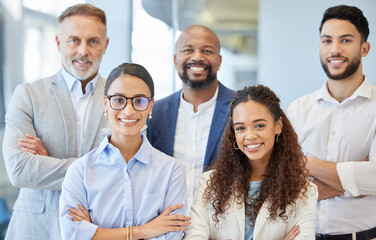 Its about having the passion for what you do. Portrait of a group of businesspeople standing together in an office.