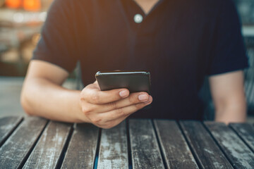 Closeup man hands touch screen on smart phone, marketing technology and business concept.