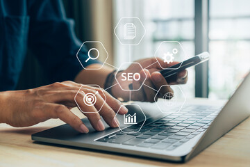 Closeup businessman working remotely at office, SEO search engine optimization concept diagram with...