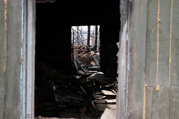 Broken glass in the house. Restoration, repair or demolition of the building is required.