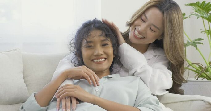 Happy lesbians woman at home, They enjoying with each other at living room. Lifestyle, Lesbians concept.