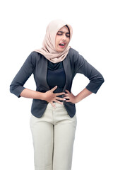 Asian Muslim woman in a headscarf feeling stomach ache