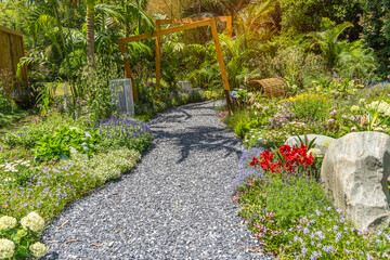 path leading through a flower garden