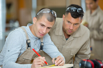 an engineer talking with apprentice
