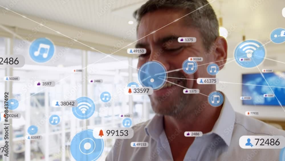 Poster animation of network of connections with media icons over biracial man using smartphone