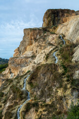 Fototapeta na wymiar Ancient hot thermal springs and pool in nature park Dei Mulini, Bagno Vignoni, Tuscany, Italy