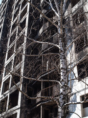 A multi-storey residential building in the city of Kyiv after a rocket attack. Military attack on...