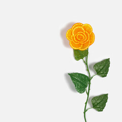 Colorful flower made of orange fruit on the white background. Minimal spring concept.