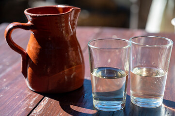 Dinner at guachinche, typical Canary Island establishment on Tenerife, where locally produced white or red wine served accompanied by homemade traditional food.