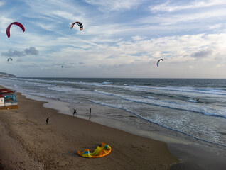 Obraz premium Water sport at cold winter water of Tyrrhenian sea between two touristic towns Sperlonga and Terracina in Lazio, Italy, aerial view