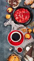 Dessert table with all kinds of cakes and snacks.