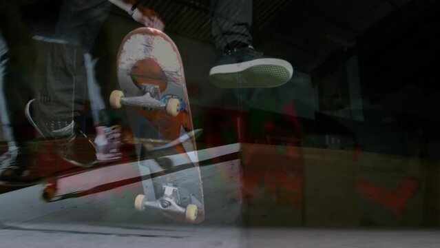 Animation of legs of skateboarder over another skateboarder jumping in background