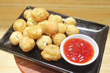 Cimol with spicy chili sauce