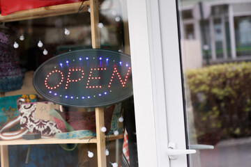 open boutique text sign board light neon on windows shop restaurant cafe store signboard