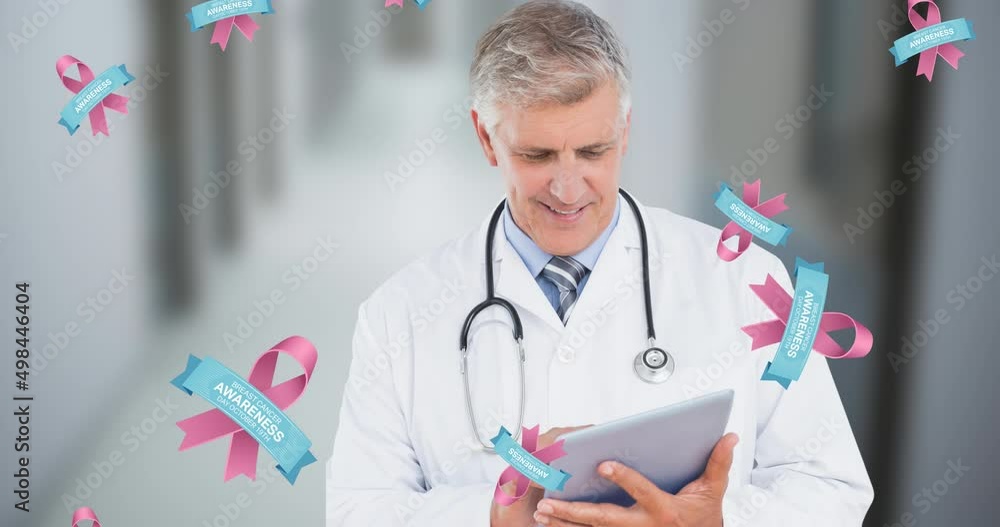 Canvas Prints Animation of breast cancer awareness ribbons over caucasian male doctor with tablet