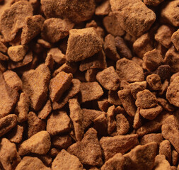 Instant coffee granules as background.
