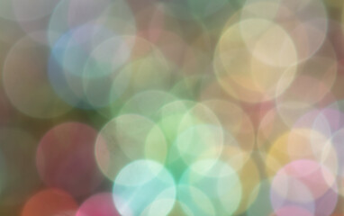 Multicolored festive bokeh as background.