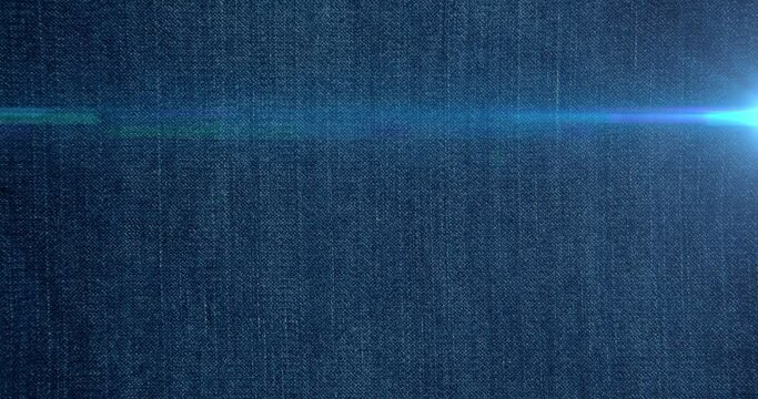 Animation of light spots over denim trousers