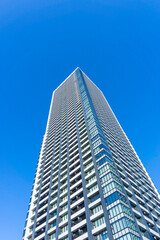 Landscape photograph looking up at a high-rise apartment_c_75