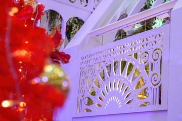 Beautiful indoor wall partition with red foreground bokeh of flower indoor