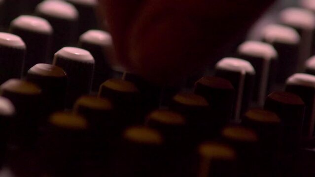 Professional multitrack sound recording, tweaking trim pots. CU