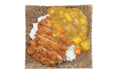 Katsu Chicken Curry Rice arranged on a wooden plate. With clipping path on isolated white background.