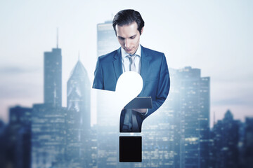 Abstract attractive european businessman with tablet and question mark shape on city background. FAQ and answer concept.