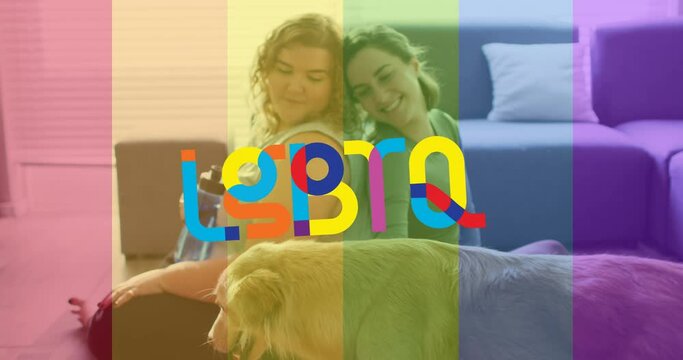 Animation of lgbtq over happy caucasian lesbian couple with dog at home