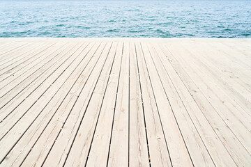 wooden floor and blue sea