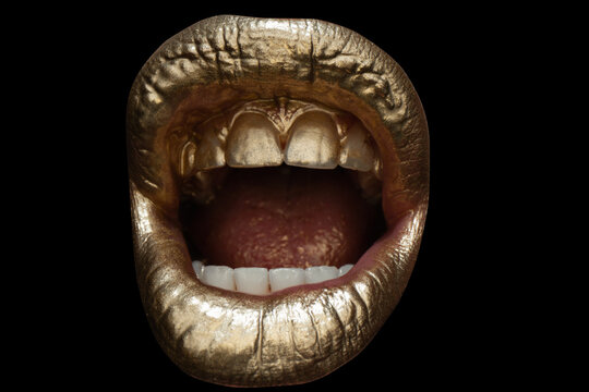Golden woman lips. Womans gold lip. Female mouth close up with golden lipstick. Screaming mouth isolated, shouting mouth close up.