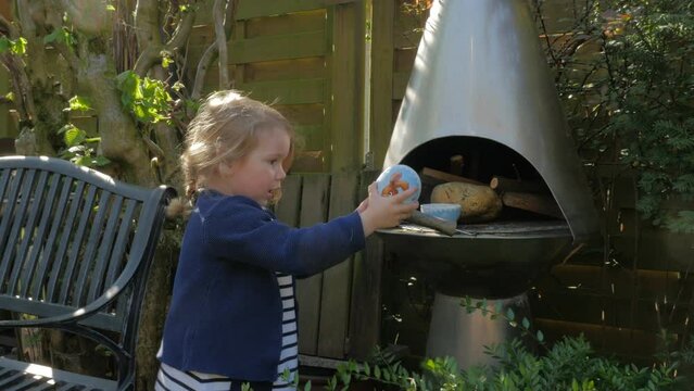 Child finding easter egg in fireplace