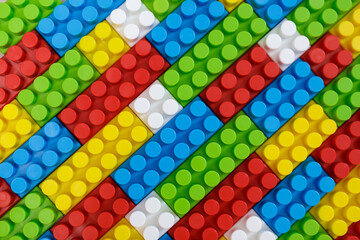 close up of colorful plastic bricks of children constructor