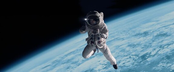 Female astronaut having a video call on her phone while performing space walk in open space, Earth in the background. Shot with 2x anamorphic lens