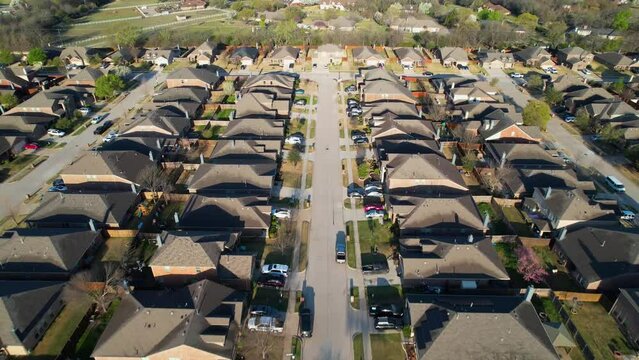 Aerial flight over neighborhood in Melissa Texas, heading west from Melissa middle school.