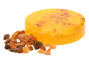 Toilet soap with pieces of natural amber stones