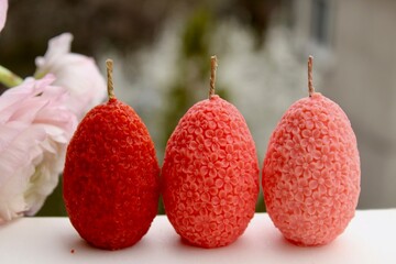 Easter eggs shaped candles. Soy wax blend hand-poured candles for easter decoration