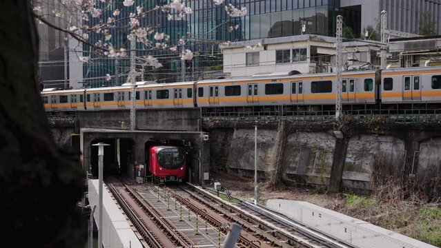 Train lines crossing in Tokyo, Spring Japan City Scene 4k
