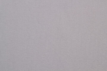 Fototapeta premium Texture of the fabric swirling in a whirlpool. cloth background. Web article template. Long header banner format. Sale coupon. Visit card. Your information. Text space.