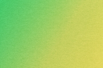 Texture of old light green and yellow paper background, with holographic gradient. Structure of olive craft cardboard