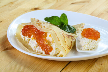 Pancake with cottage cheese and jam