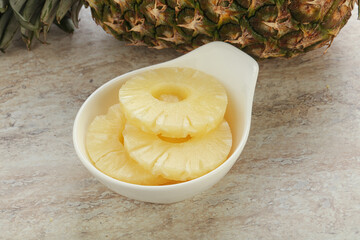 Marinated pineapple rings in the bowl