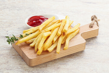 French fried potato over board