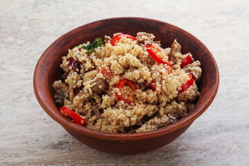 Arabic cous cous with meat and tomato