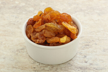 Sweet yellow raisin in the bowl