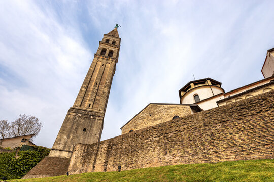 Cathedral of the small town of Oderzo (Duomo di San Giovanni Battista, Saint John Baptist) with the leaning bell tower, XI century - 1535. Treviso province, Veneto, Italy, Europe.