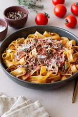 Pasta tagliatelle with bolognese sauce. Italian cuisine. Traditional recipe.