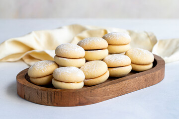 Fototapeta na wymiar Cookies on a white background. Delicious filled cookies. Bakery products. close up