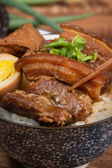 Braised pork belly over cooked rice, famous and delicious street food in Taiwan.